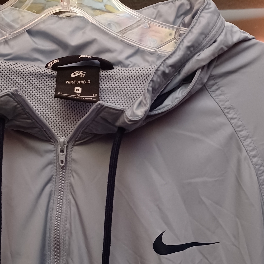 Baby blue Nike windbreaker